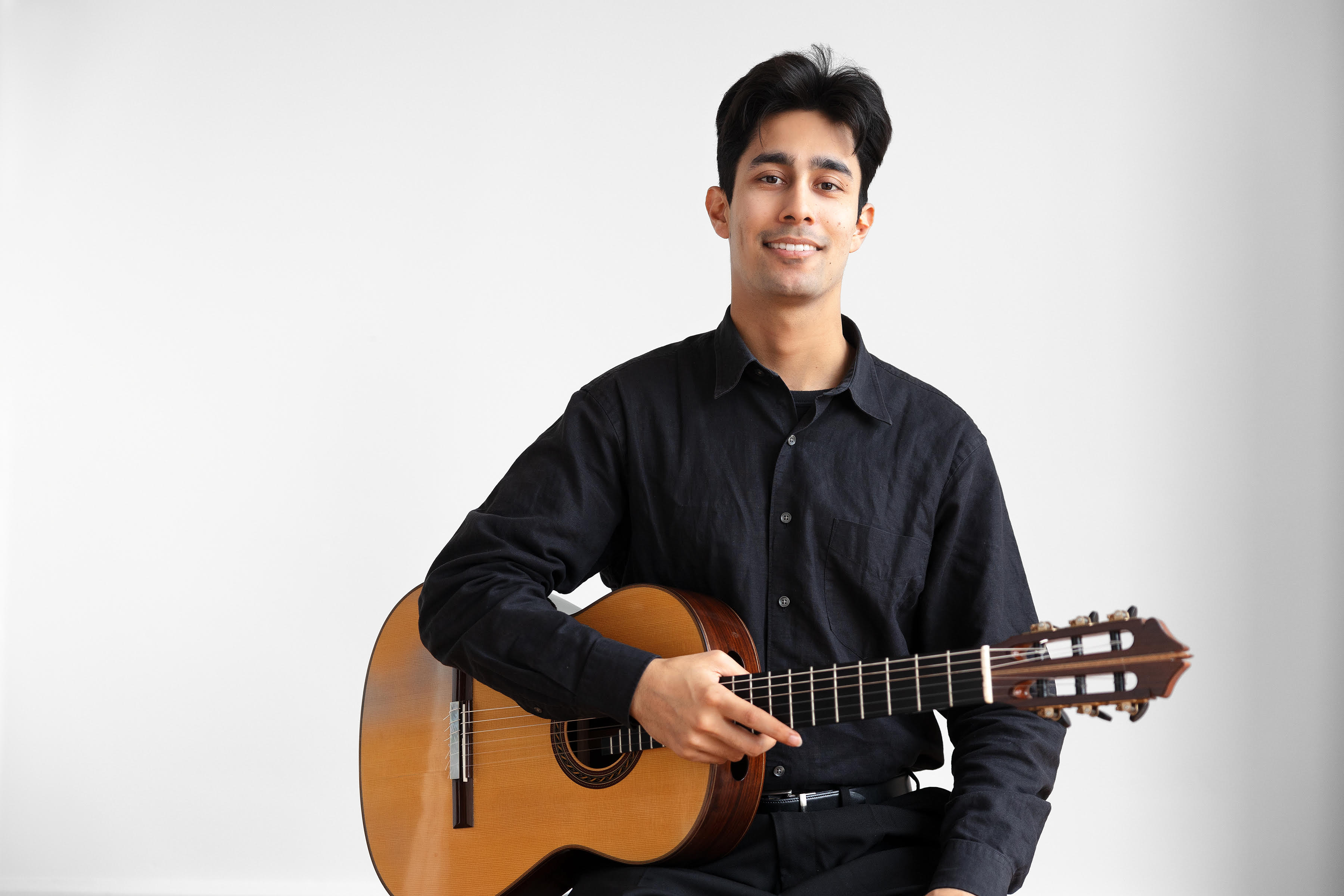 holding-guitar-white-background.jpg